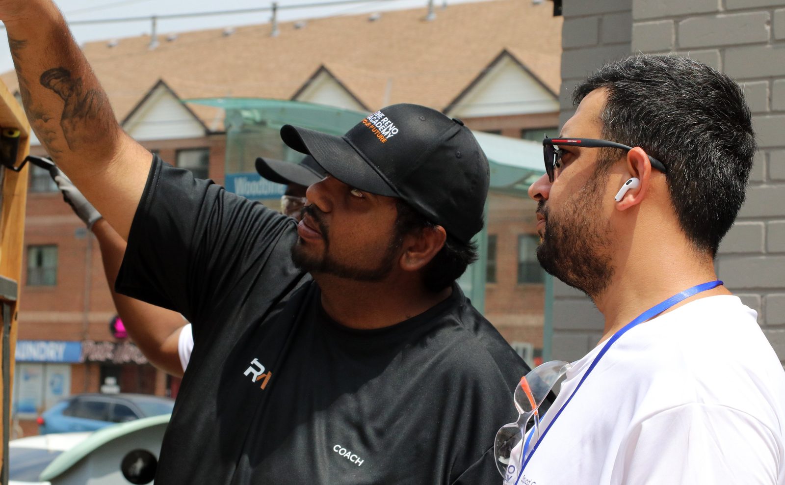 Reno Academy coach mentoring a Site Squad Bootcamp LE student on a Toronto job site